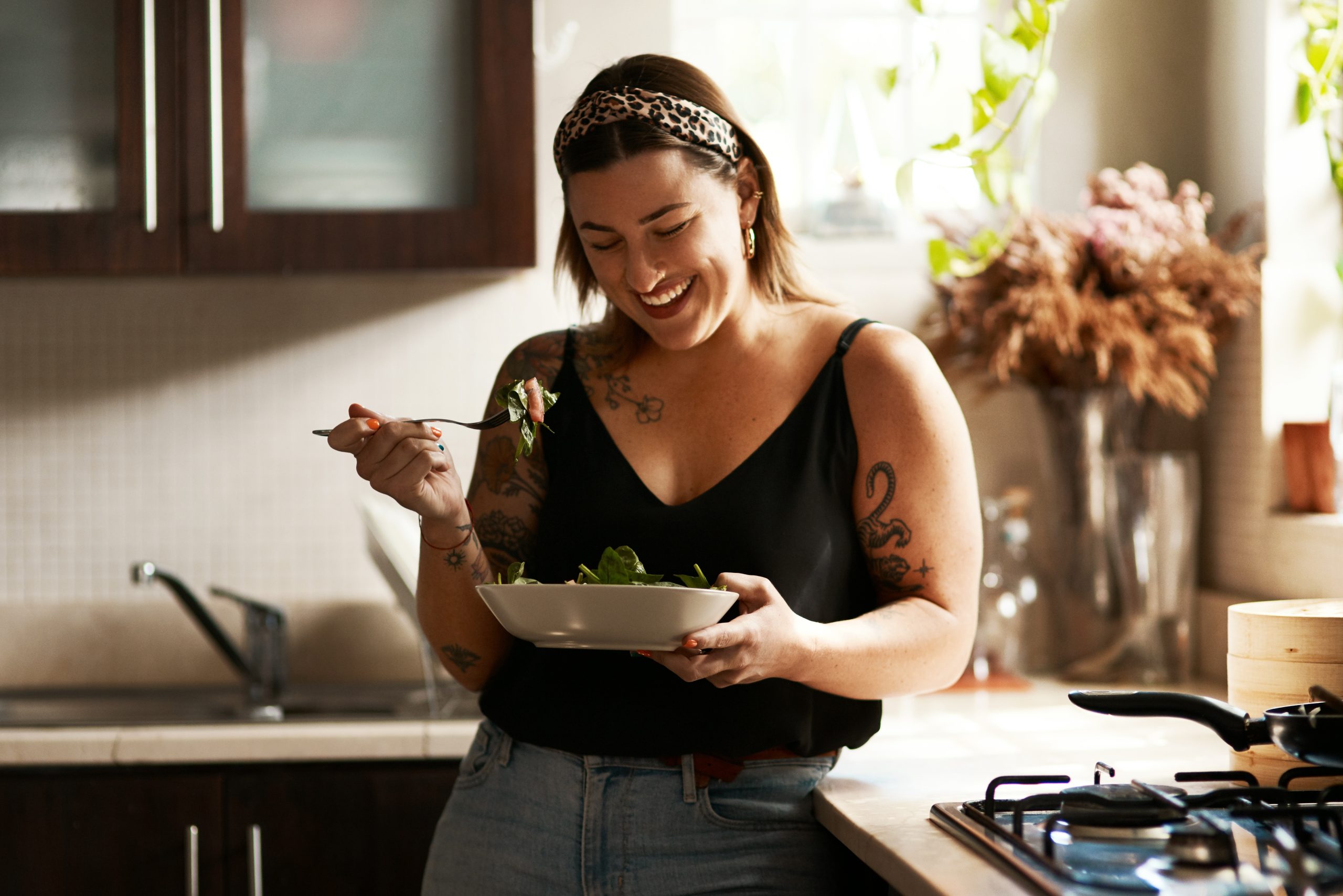 Woman,,Diet,And,Person,Eating,Salad,In,Her,Home,Kitchen